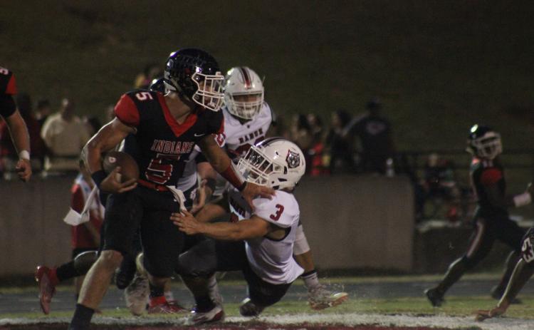Rabun County linebacker AJ Wheeler (3) attempts to tackle Stephens County running back Hudson Spurlock (5) during the first half in Toccoa last Friday night. (Glendon Poe/The Clayton Tribune)