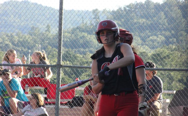Rabun County’s Mary Lovell gets instructions from coach Angela Shepheard during an at-bat against Social Circle at Rabun County High School in Tiger last Thursday. (Glendon Poe/The Clayton Tribune)