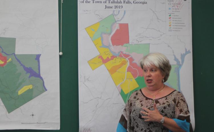 Tallulah Falls Mayor Teri Dobbs looks over a zoning map of the town at a joint work session of the City Council, Downtown Development Authority and Planning Commission last Thursday. City officials plan to add updates to the 1999 zoning map.