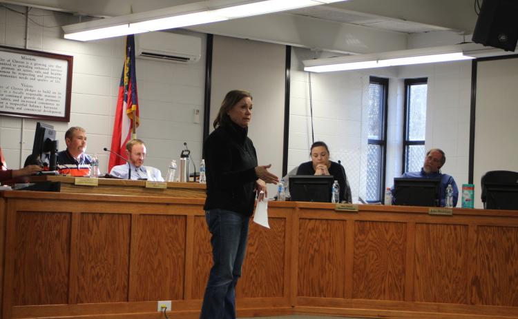 Megan Broome/The Clayton Tribune. Kathy Lee addresses Clayton City Council members at their meeting Tuesday to discuss meter cost concerns on a property she owns in Mountain City where she plans to have a community of tiny homes.