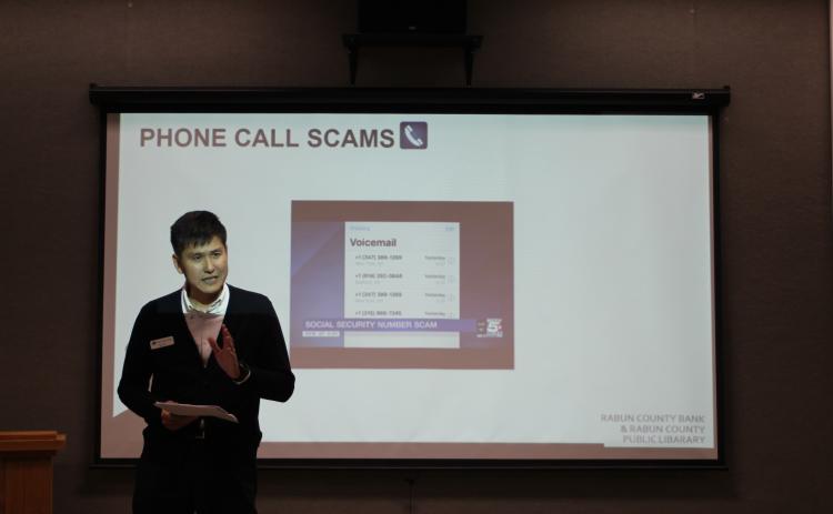 Yong Kim, executive vice president and CFO of Rabun County Bank, speaks to a group at a lunch and learn sponsored by Rabun County Bank about how to spot fraud and prevent being scammed on Tuesday, Jan. 28 at the Rabun County Library.