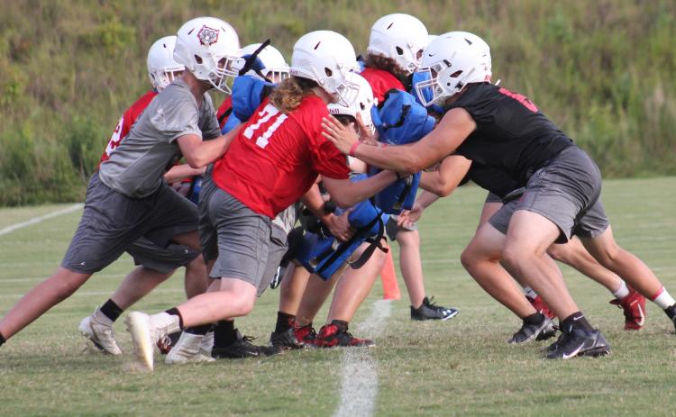 Andy Diffenderfer/The Clayton Tribune. The Rabun County Wildcat gridders opened practice Monday.