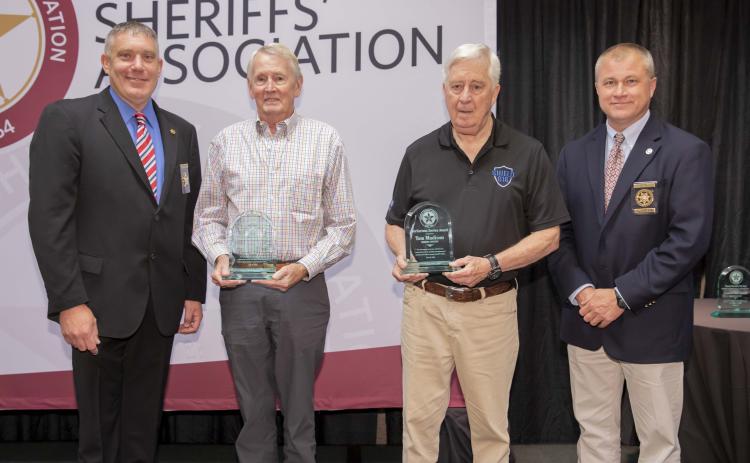Photo courtesy Rabun County Sheriff's Office. Rabun residents Stephen Wright and Tom Madison were presented with the Meritorious Award at the Georgia Sheriffs’ Association Summer Conference at Lake Lanier recently. Above, from left: Rabun County Sheriff Chad Nichols, left, Stephen Wright, Tom Madison, and Georgia Sheriffs’ Association President and Lumpkin County Sheriff Stacy Jarrard.