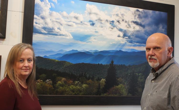 Michele Crawford, left, and Broderick Crawford own Crawford Art Gallery in Clayton and on December 1 celebrated 25 years of having a Main Street storefront.