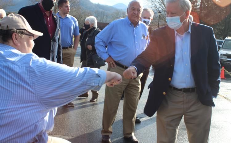 Megan Broome/The Clayton Tribune. Rabun County GOP Secretary Ed Henderson receives a fist bump from South Carolina Senator Lindsey Graham last week at a campaign rally held at The Dillard House.