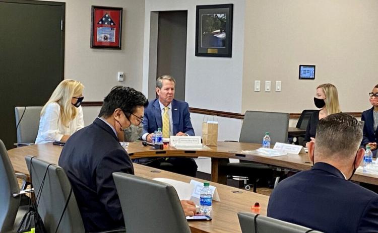 Beau Evans/Capitol Beat News Service. Gov. Brian Kemp (right) and First Lady Marty Kemp (left) led a roundtable meeting on human trafficking in Atlanta on Sept. 30, 2020.