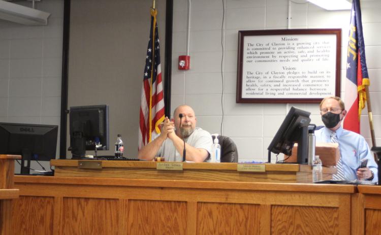 Megan Broome/The Clayton Tribune. Clayton Council Member David Cross, left, serves as Mayor Pro Tempore at Tuesday’s council meeting in Mayor Jordan Green’s absence.
