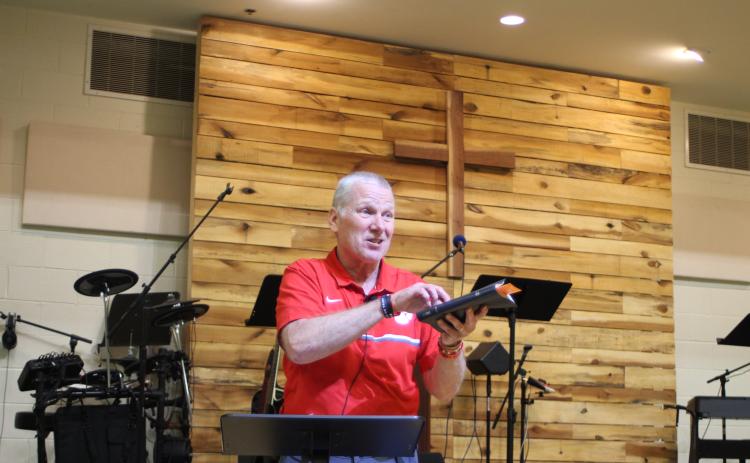 Megan Broome/The Clayton Tribune. David Rogers, associate pastor of youth and ministry at Clayton Baptist Church, preaches a sermon about church membership to the youth group last Wednesday. Rogers has served at the church for 35 years.