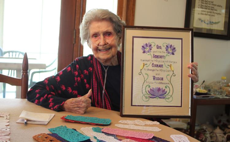 Megan Broome/The Clayton Tribune. Mildred Widgery plans to make 100 bookmarks to distribute in honor of her 100th birthday.
