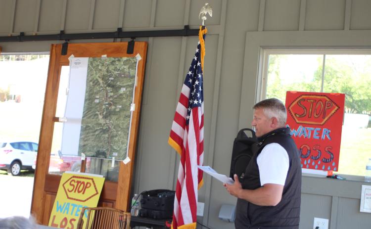 Megan Broome/The Clayton Tribune. Darrin Giles, county administrator, speaks to citizens about the county’s stance on the city’s recent counter-offer to sell their water and sewer system, at a forum hosted by the Rabun County Coalition for Good Government on Monday.