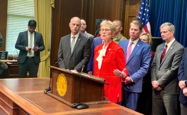Beau Evans/Capitol Beat News Service. Georgia Public Health Commissioner Kathleen Toomey talks about coronavirus testing at a news conference on March 5, 2020.