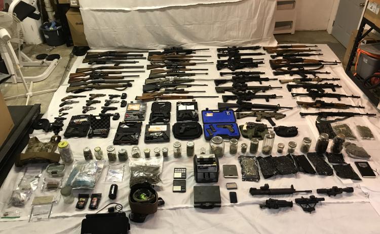 Photo courtesy of the Rabun County Sheriff’s Office. A search warrant executed by the RCSO at a residence in Rabun Gap resulted in the seizure of multiple suspected narcotics, numerous firearms and a large amount of ammunition. The DNR was also called to assist with wildlife remains. Three people were arrested as a result of the investigation.