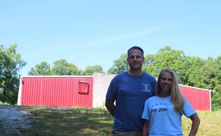 Megan Broome/The Clayton Tribune. Stephen Flaherty, left, and Suzie Nixon Flaherty along with partners Dorothy Welch and Rob Hamrick recently purchased the Mountain City Playhouse in an effort to restore it and bring back traditional activities like roller skating, square dancing and clogging. The goal is to bring back the “heritage” of the area. Restorations are planned to be completed within six months to a year.