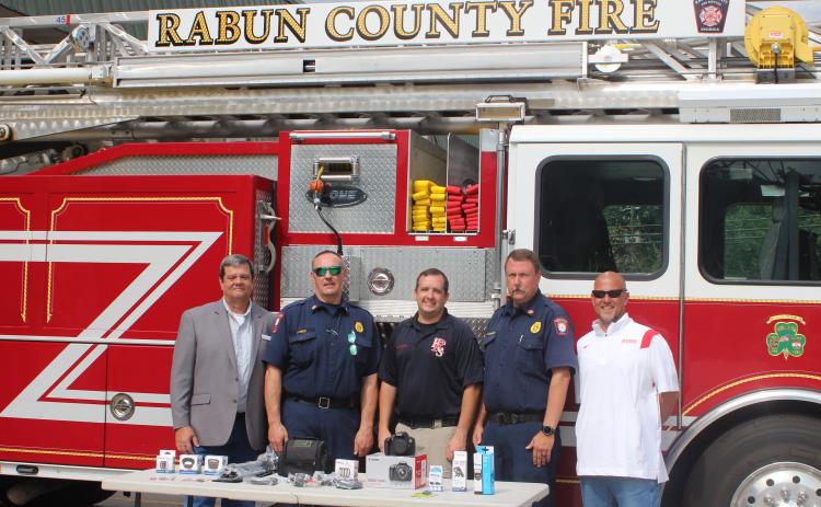 Megan Broome/The Clayton Tribune. From left are Kenneth LeCroy, consultant for Georgia Arson Control, Fire Chief James Reed, Lt. Ryan Bramblett, fire investigator for Rabun County, Assistant Fire Chief Justin Upchurch and Commissioner Scott Crane.