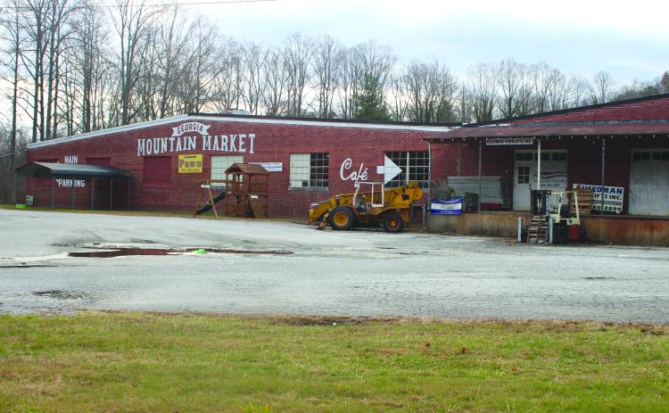 Megan Broome/The Clayton Tribune. MedLink Georgia has bought the Georgia Mountain Market building. The 75,000-square-foot structure with 12 acres currently houses the indoor flea market and other businesses. The building was originally established in 1952 as a factory producing garments.