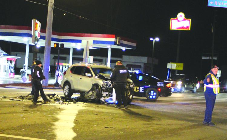 Megan Broome/The Clayton Tribune. Officials investigate one of the three vehicles involved in a Jan. 20 crash on Ga. 15 in Clayton.