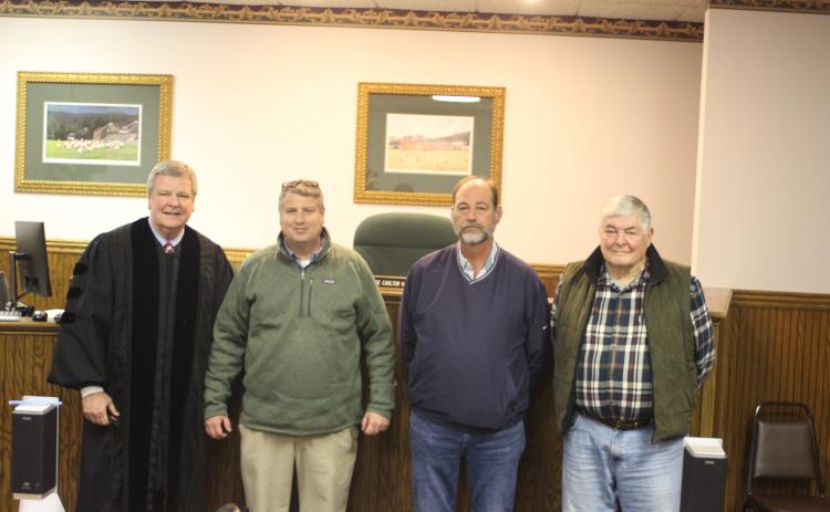Megan Broome/The Clayton Tribune. Dillard candidates for mayor and council member positions were sworn-in to office Tuesday by Probate Judge Carlton H. Jones III in the Probate Courtroom at the Rabun County Courthouse. Probate Judge Carlton H. Jones III, left, Mayor Claude Dillard, Council Member Jeff Harris and Council Member Tremaine “Terry” Wilson pose for photographs following the ceremony.