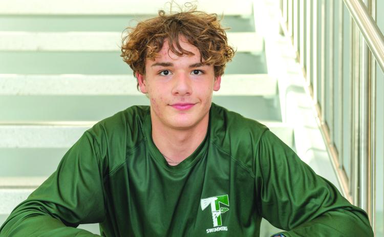 Photo by E. Lane Gresham. Emre Sungur, a freshman from Turkey, excels in pool for TFS.