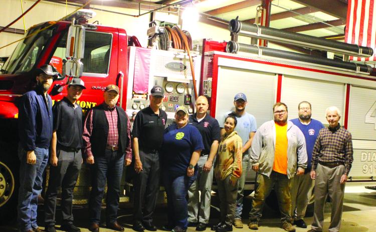 Megan Broome/The Clayton Tribune. Rabun County Fire Services Station 4-Lakemont/Wiley received a donation from the 100 Club of Rabun County during a presentation at Station 4 Monday. Pictured are Firefighters Thomas Plott, left, and Cody Jordan with Charlie Breithaupt of the 100 Club of Rabun County along with Gordon Van Mol, Elisha Higgins, Capt. John Murray, Selena Harvey, Christopher Fairholt, Ti Urpschot, Casey Yarnall, and Denny Webb of the 100 Club of Rabun County.