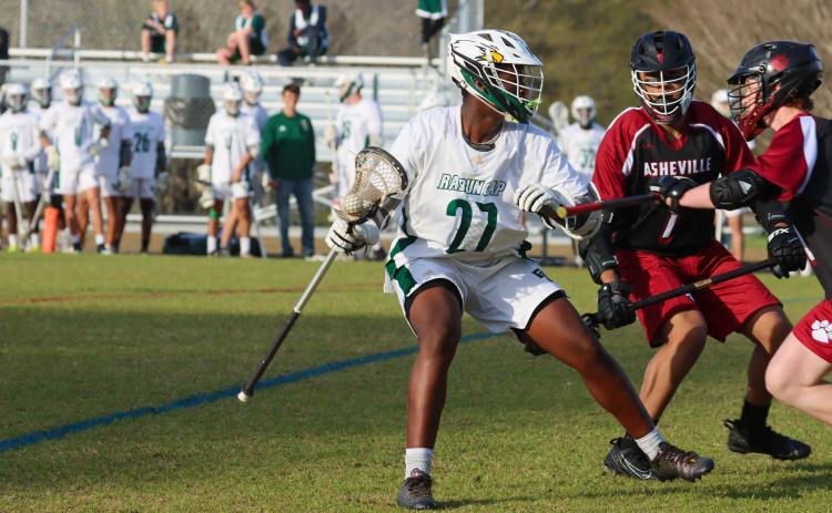 RGNS Athletics. Bryce Phillips goes on the offensive against Asheville High School.