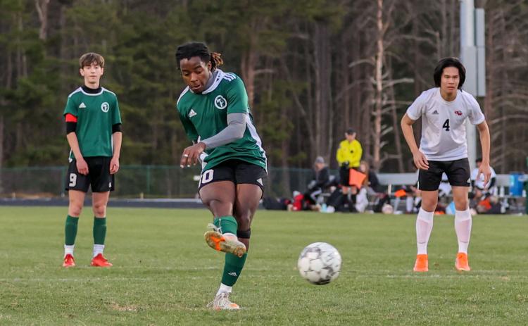 Photo by Austin Poffenberger. Sean Lynes, Jr. converts on penalty kick to help Tallulah Falls defeat George Walton 2-0.