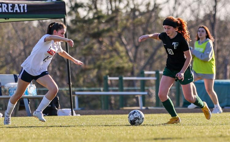 Photo by Austin Poffenberger. TFS’s Jenna Chesser  finished the March 29 game against George Walton with a goal and assist.