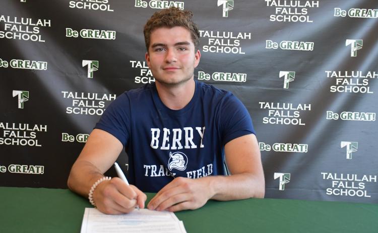 Photo courtesy Elisha Boggs. George Ketch signs with Berry College track and field.