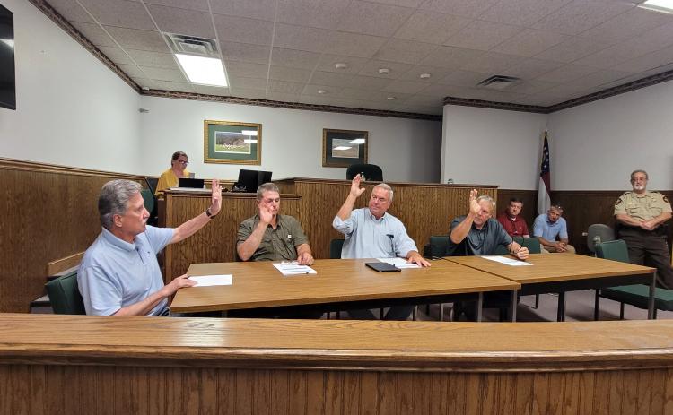 Megan Broome/The Clayton Tribune. Commissoners approve the $26.6 million budget.