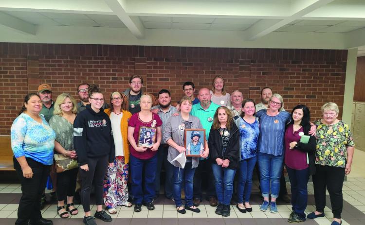 Megan Broome/The ClaytonTribune. Dozens of family members and friends of Rabun County Detention Center Officer Courtney Faith Zajdowicz donned memory buttons of Zajdowicz during the May 25 court hearing. Jaime Avila Reyes was sentenced to 15 years to serve.