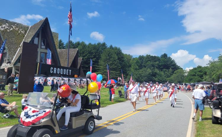 Megan Broome/The Clayton Tribune. A Sky Valley croquet team made its way through the Sky Valley Grand Parade on July 2 as part of Independence Day festivities. The croquet team chanted and danced through the parade and stopped periodically to perform a show for spectators.