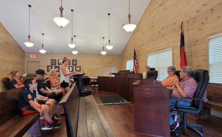 Megan Broome/The Clayton Tribune. Tiger City Council members listen to April Biagioni at last month's meeting.