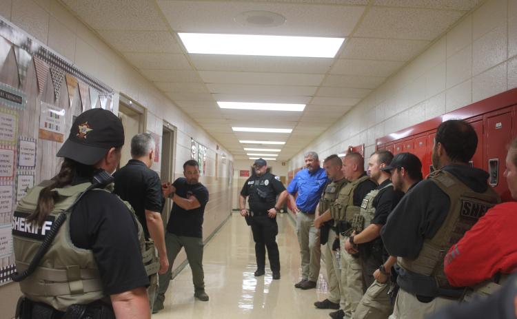 Megan Broome/The Clayton Tribune. Law Enforcement Officers received training to remain proficient in firearms, building clearing and incident response measures in the event of an active shooter at Rabun County Schools and the shooting range last week. This was part of the week-long active shooter response training that happens every year in Rabun County. RCSO Deputies spent the entire summer training and preparing for students to head back to school Aug. 5.