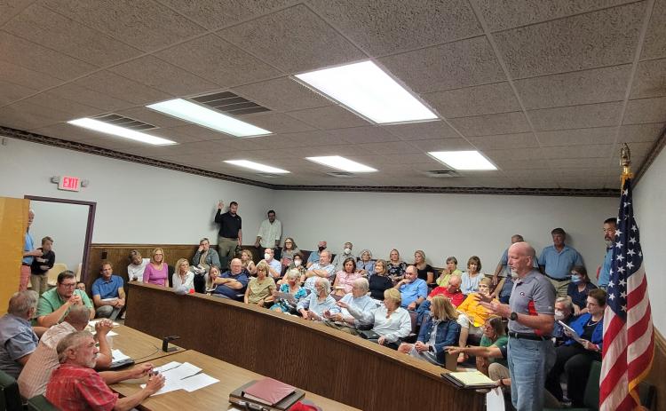 Megan Broome/The Clayton Tribune. Matt Mitcham addresses Rabun County Planning and Zoning Board members last month about rezoning concerns of 5.45 acres of land on Bridge Creek Road from Agricultural (A) to Specific Purpose (SP) for the development of storage units for boats, RV and self-storage.