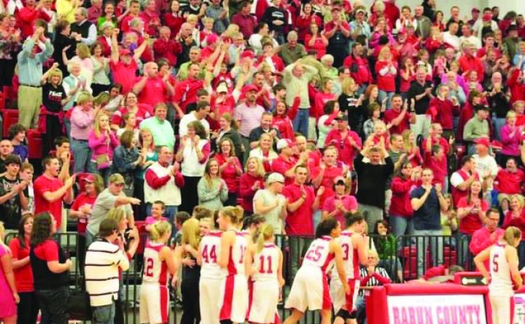 Submitted photo. A standing room-only crowd enthusiastically responds to the Lady Cats in the region tourney of 2011.
