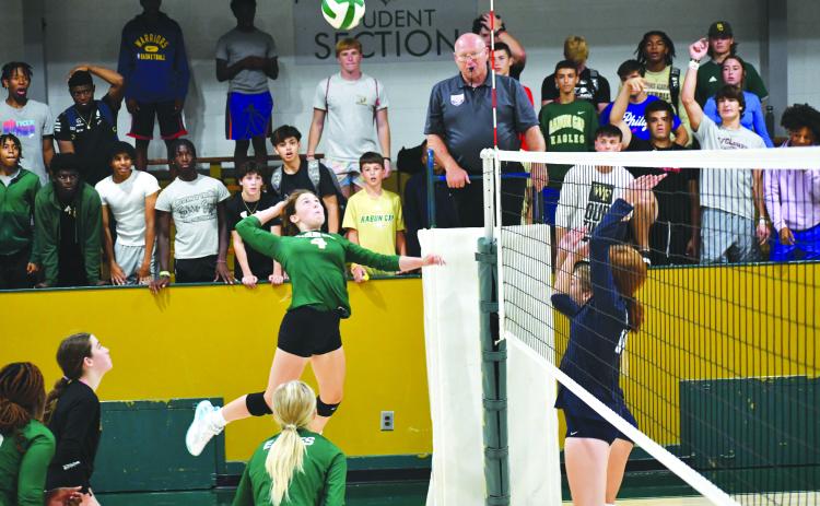 Luke Morey/The Clayton Tribune. Freshman Cassidy Klimasewski goes up for a kill against Asheville School. The Eagles fell 0-3 to Asheville. Klimasewski won the RGNS player of the week.