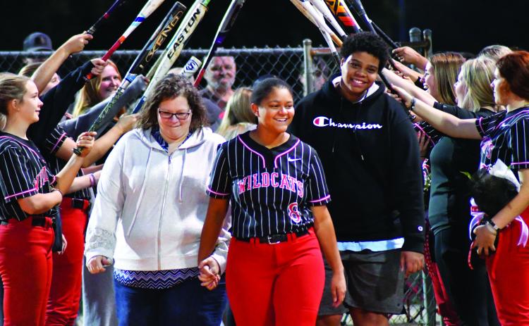 Enoch Autry/The Clayton Tribune. Senior Abigail Warren is escorted by her mother Tammie Payne and brother Joseph Payne.