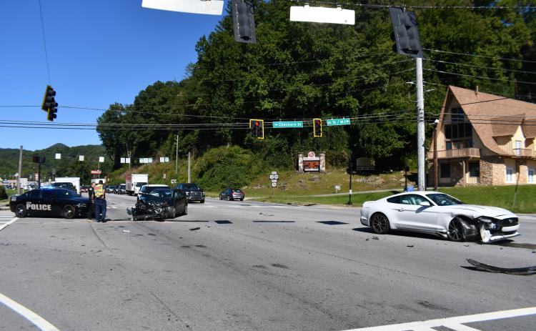 Megan Broome/The Clayton Tribune. Rabun County emergency personnel work the scene of a crash involving two vehicles that occurred on Georgia Highway 15 at Chechero Street in Clayton on Sept. 27.