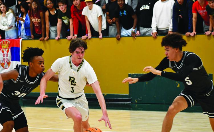 Luke Morey/The Clayton Tribune. Senior Theo Antinori drives in the scrimmage against Marietta last Wednesday night. Antinori finished with 12 points and seven rebounds. The Eagles went 2-0 on Saturday, defeating Lake Pointe Academy and Greenville Classical while limiting them both to under 30 points.
