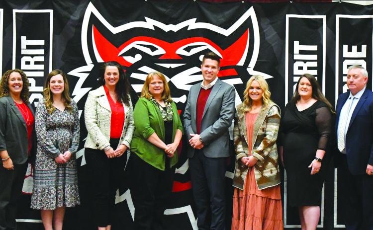 Enoch Autry/The Clayton Tribune. Pictured with their schools’ principals are this year’s four top teachers. From left are middle school principal Kechara Partin and RCMS teacher Emily Lovelady; primary principal Carla Truelove and teacher Sharon Lampros; high school principal Justin Spillers and teacher Hannah Miller; and elementary school teacher Natasha Mazarky and RCES principal Jonathan Welch. Mazarky also is this year’s system teacher of the year.