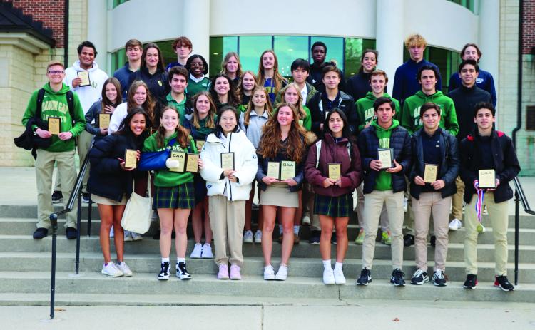 RGNS Athletics. The Rabun Gap-Nacoochee Upper School award winners pose with their plaques.