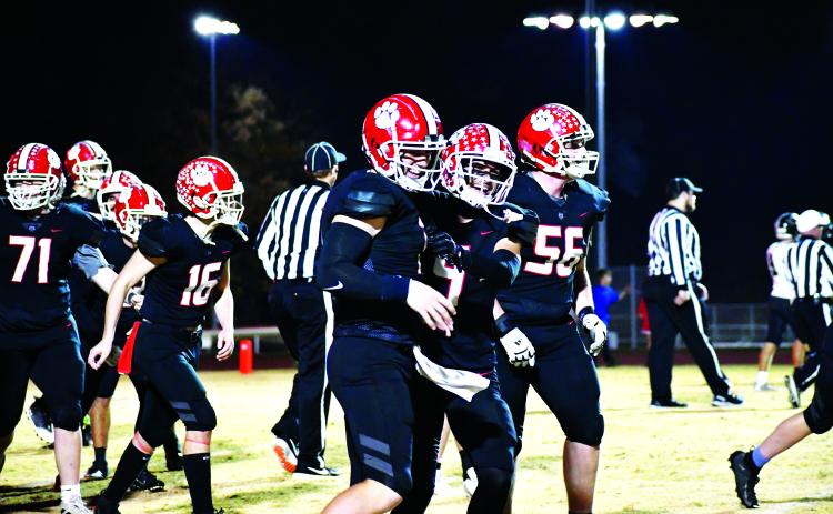 Luke Morey/The Clayton Tribune. Senior Keegan Stover (left) was named “Offensive Player of the Year” for Region 8 while senior Noah Legault (middle) made All-Region first team as a wide receiver. Both seniors transferred to Rabun County this year and made an immediate impact. Sophomore Alex Yearwood (56) also made the All-Region second team.