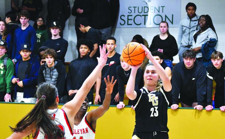 Luke Morey/The Clayton Tribune. Senior Tuana Coskun hits a jumper in the home opener against Wesleyan Christian Academy on Friday night. Coskun ended with 18 points and seven rebounds as she’s been leading the team with 15 points per game. On Saturday against Asheville, Coskun scored 13 in only the Lady Eagles’ second loss of the season.