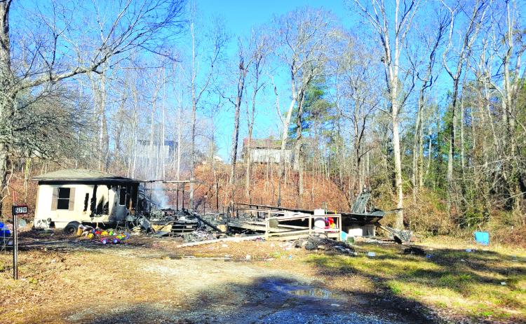 Megan Broome/The Clayton Tribune. The cause of the fire at 579 Connector Road off Camp Creek Road in Wiley remains under investigation by the State Fire Marshal’s Office.