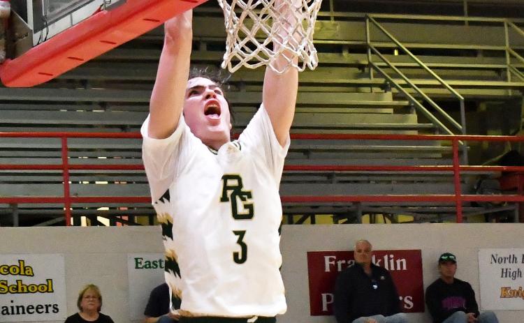 Luke Morey/The Clayton Tribune. Rabun Gap senior Theo Antinori goes up for a dunk late in the fourth quarter against The Skill Factory on Saturday, Jan. 21. Antinori finished with 27 points as he helped the Eagles defeat the third-ranked team in Georgia.