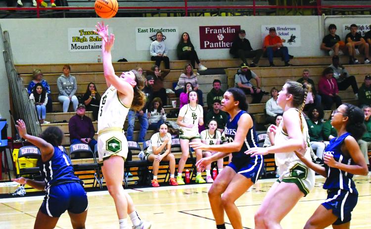 Luke Morey/The Clayton Tribune. Junior Kornelia Ignerska goes up for a layup in the second half against Asheville on Saturday, Jan. 7. Ignerska helped lead the Lady Eagles to a 72-34 victory with nine assists and six points.
