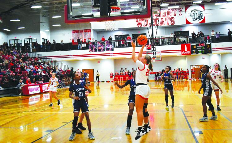 Luke Morey/The Clayton Tribune. In front of a packed gym on Friday, Jan. 20, RCHS junior Ellie Southards lays in a basket in the third quarter against last year’s state champ Elbert County. In the first rematch between Elbert and RCHS since last year’s GHSA AA state title game, the Lady Cats won 55-49.