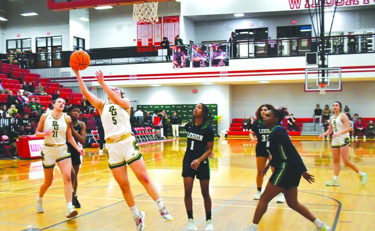 Luke Morey/The Clayton Tribune. RGNS junior Kornelia Ignerska hits a layup in the second half against Legion Collegiate Academy on Saturday, Feb. 11. Ignerska ended with eight points as the Lady Eagles won 61-47 in the final game of the season.