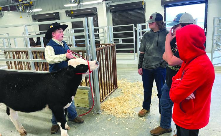 Submitted photo. FFA members give a tour of the Agricenter facilities to all interested guests after the Rabun County FFA officers hosted The Rising Sun Community Breakfast on Tuesday.