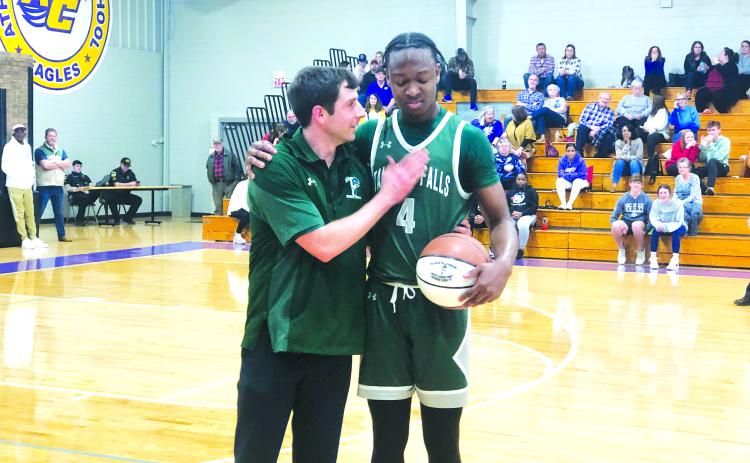 TFS Athletics. TFS senior Anfernee Hanna receives a game ball from TFS coach Cody Coleman after a game against Athens Christian on Friday, Jan. 20. During the game, Hanna surpassed 1,000 career points for his career. In the games following, Hanna became the all-time leader in wins with 62 and counting. Hanna and the TFS basketball team have three more games untl the region tournament begins on Monday, Feb. 13.