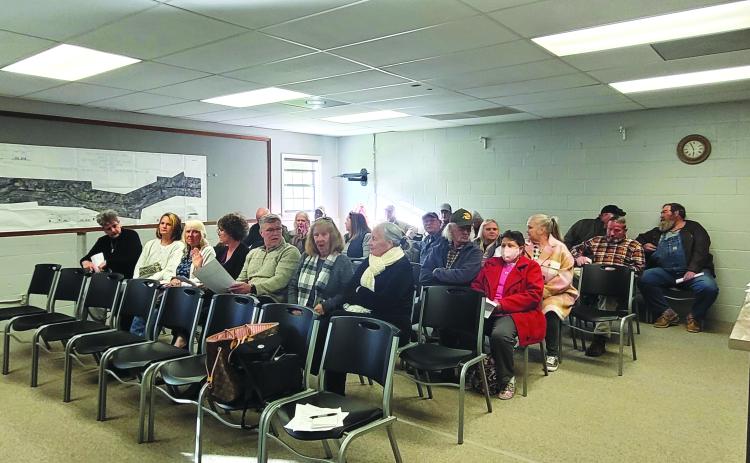Megan Broome/The Clayton Tribune. Dozens of people attend the Mountain City council meeting Tuesday night to ask questions and discuss the recent sudden closure of the Mountain City U.S. Post Office.